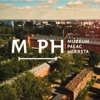The photo shows a view of the city from above. In the center is the MPH logo.
